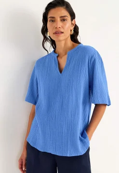 Blus i krinklad bomull