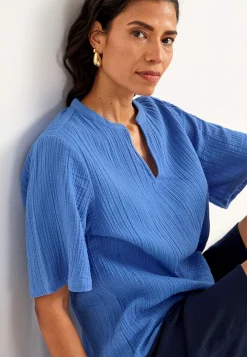 Blus i krinklad bomull