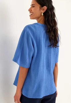 Blus i krinklad bomull