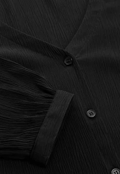 Blus med crepe-kvalitet