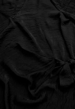 Blus med knytband
