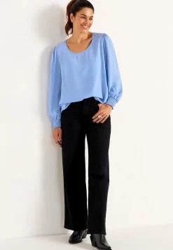 Blus med smock i ärmsluten
