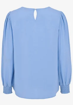 Blus med smock i ärmsluten