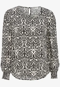 Blus med smock i ärmsluten