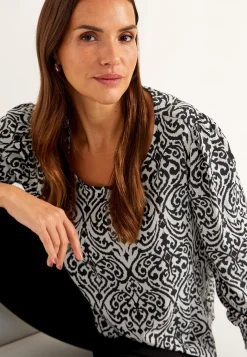 Blus med smock i ärmsluten