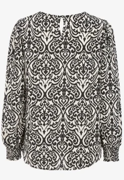 Blus med smock i ärmsluten