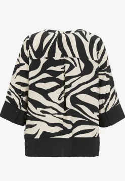 Blus med zebramönster