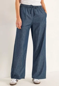 Byxa i denim med vida ben