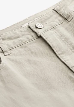 Caprijeans med femficksdesign
