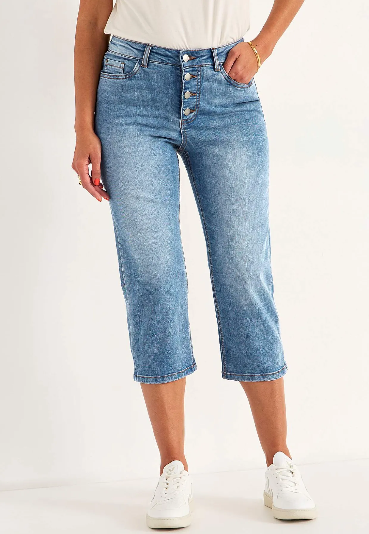 Caprijeans med knappgylf