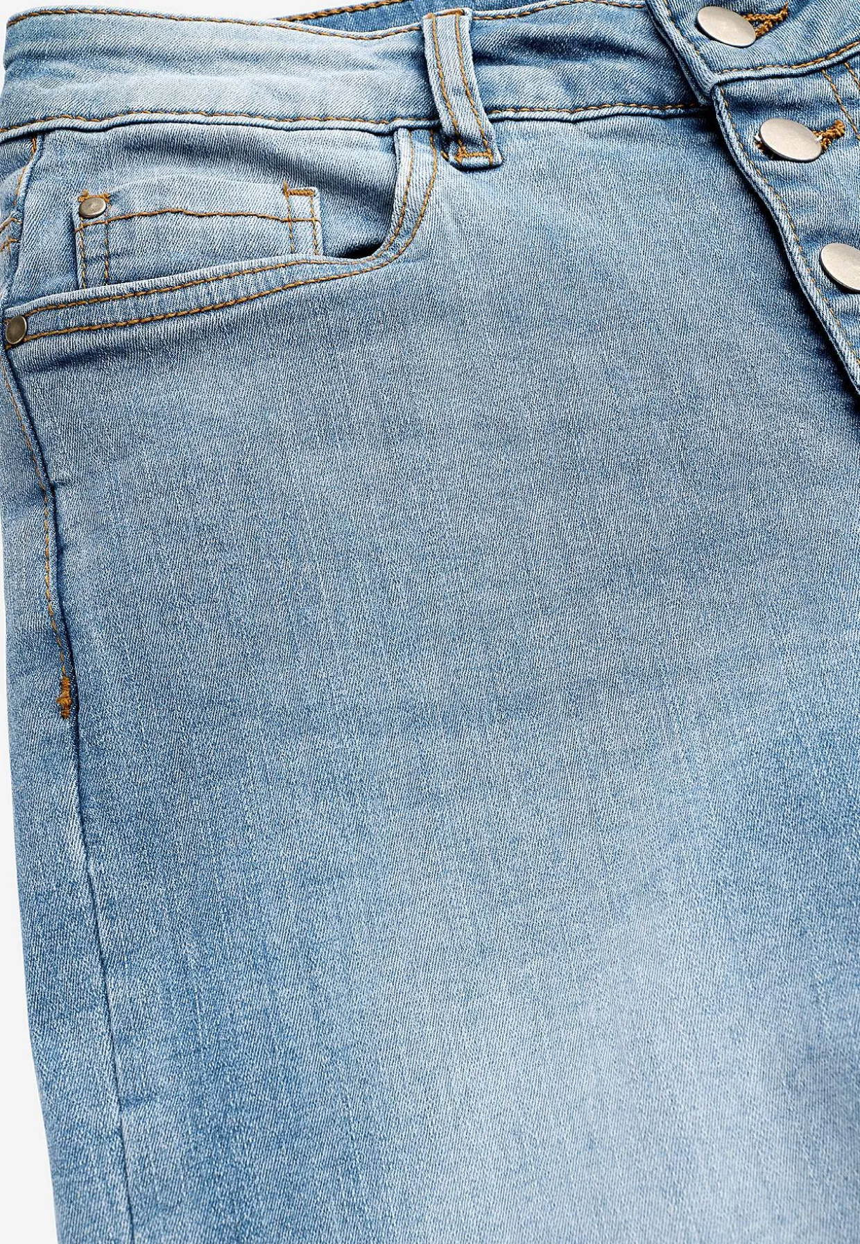Caprijeans med knappgylf