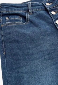 Caprijeans med knappgylf