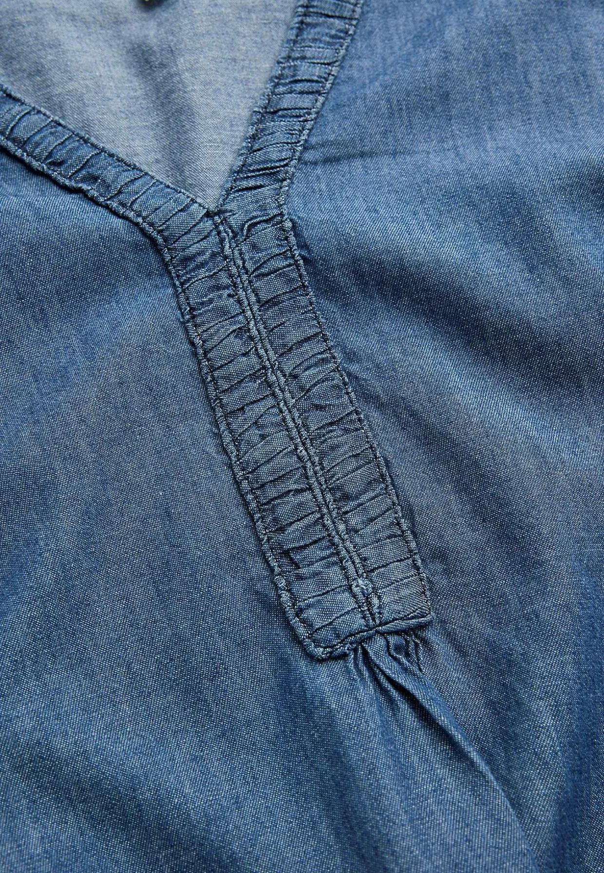 Denimtunika med dekorativ v-ringning
