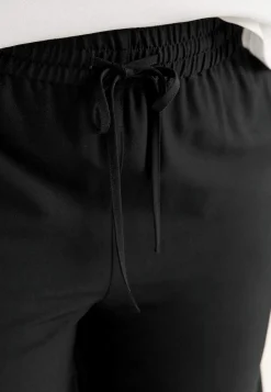 Dressad dra på-byxa Pia