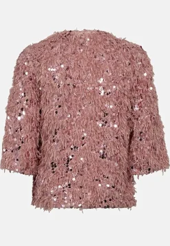 Festtopp med fjäderliknande material och paljetter