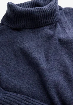 Stickad polotröja med omlottdetalj fram