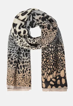 Stickad scarf med franskant