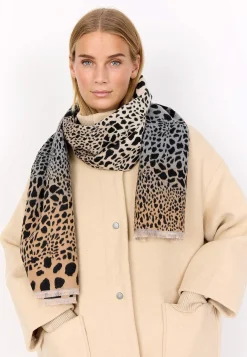 Stickad scarf med franskant