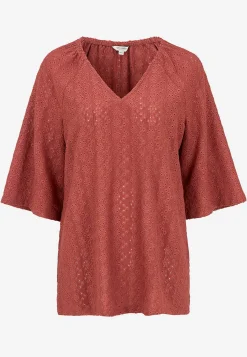 Trikåtunika med hålbroderi