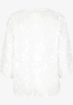 Vävd blus med brodyr
