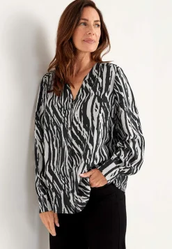 Vävd blus med knappar