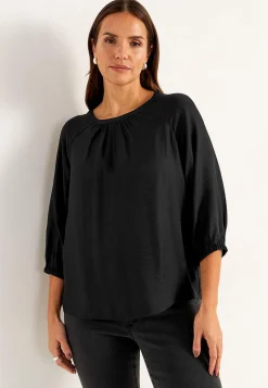 Vävd blus med struktur
